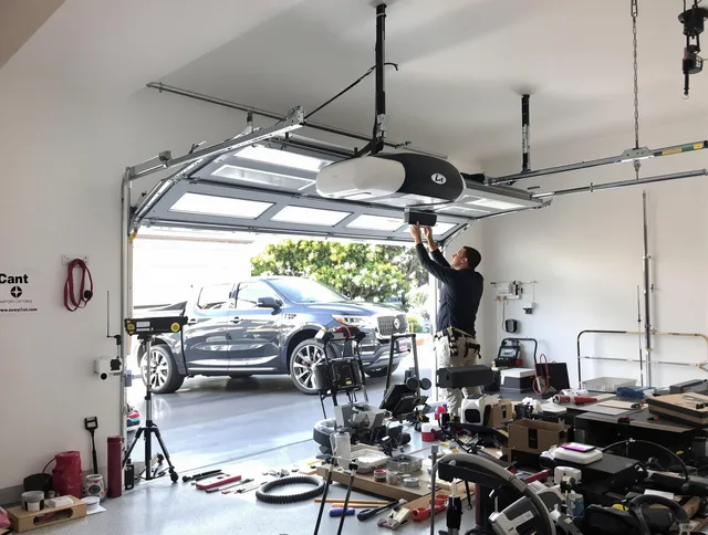 Bonita Springs Garage Door Repair specialist installing smart garage door opener system in Bonita Springs home
