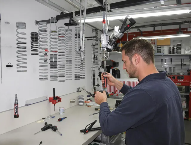 Bonita Springs Garage Door Repair safety certified technician performing precision spring replacement in Bonita Springs
